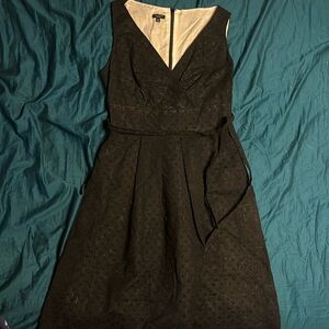 Talbots black v neck dress with pleated skirt.  Size 8.
